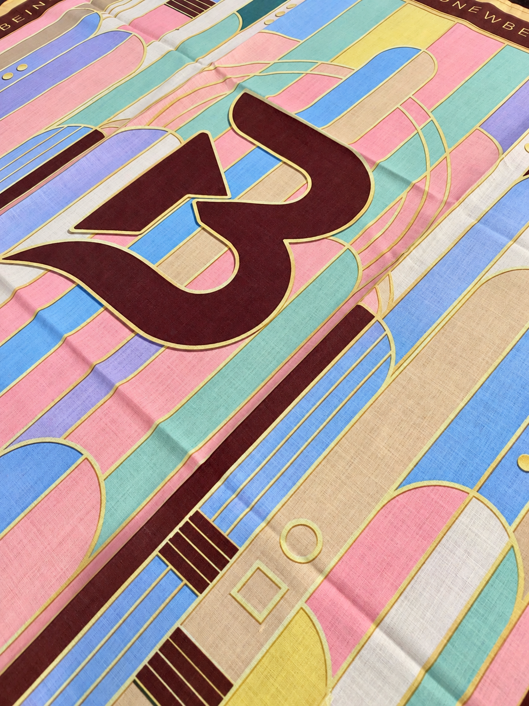 B monogram and cotton weave detail