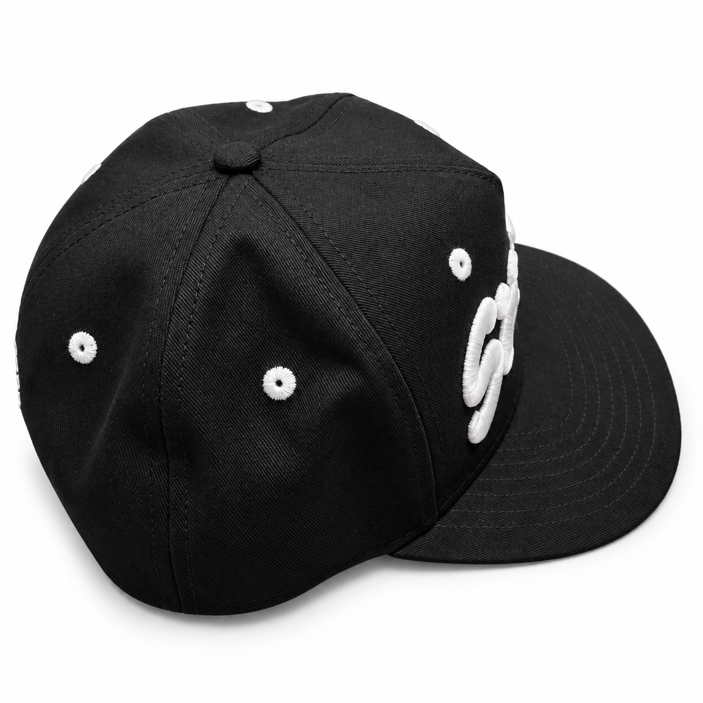 Black SMILE embroidered hat — studio side-right view