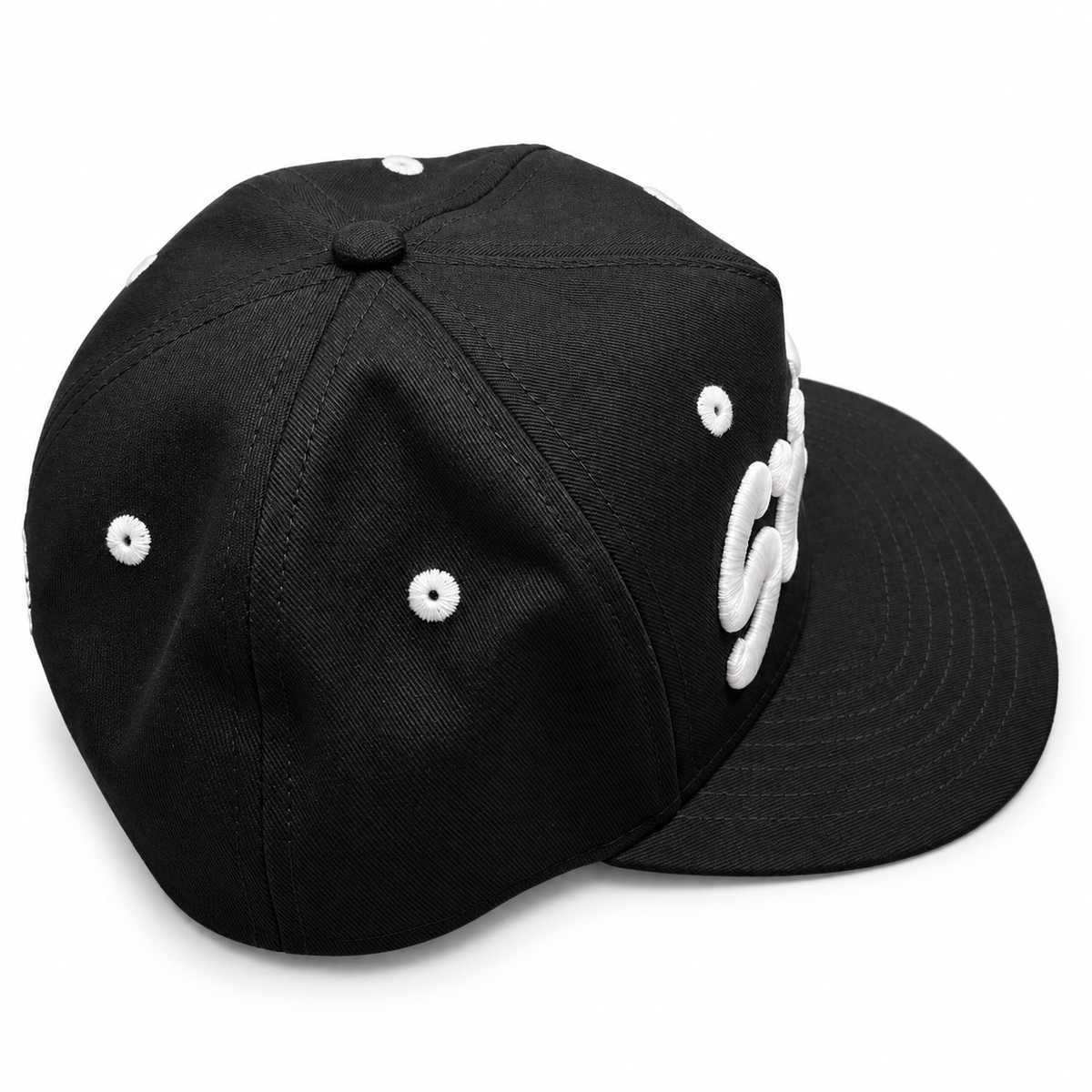Black SMILE embroidered hat — studio side-right view